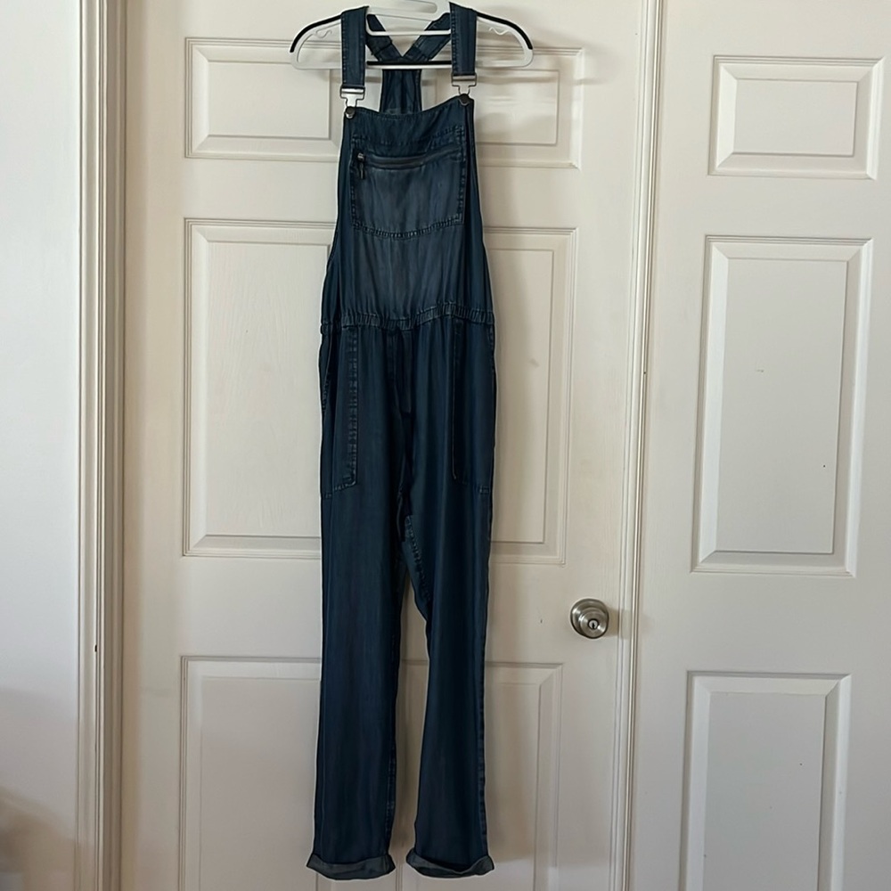 No brand.  Denim.  Tencel type fabric so very cool.  Draw string waist.